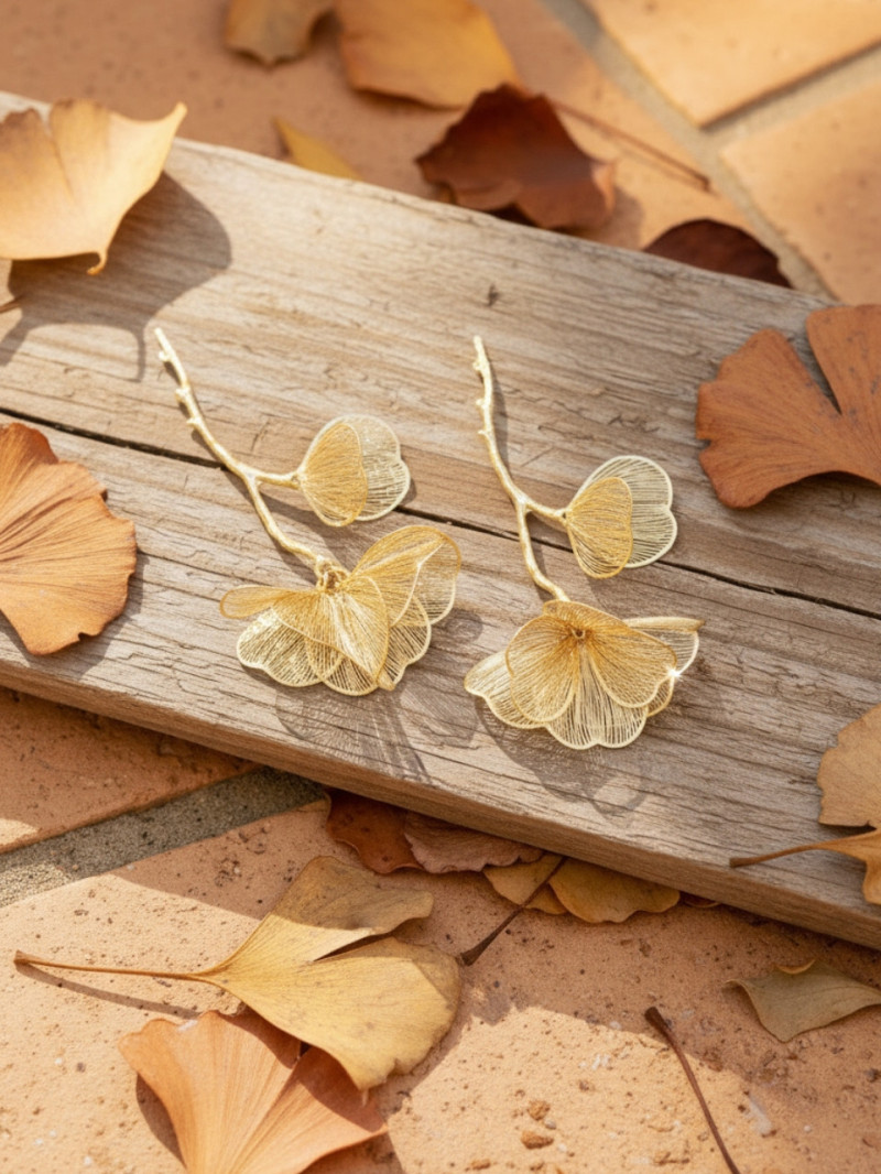 Pendientes largos flor dorados y plateados – Pendientes de invitada – Vestidos Araya