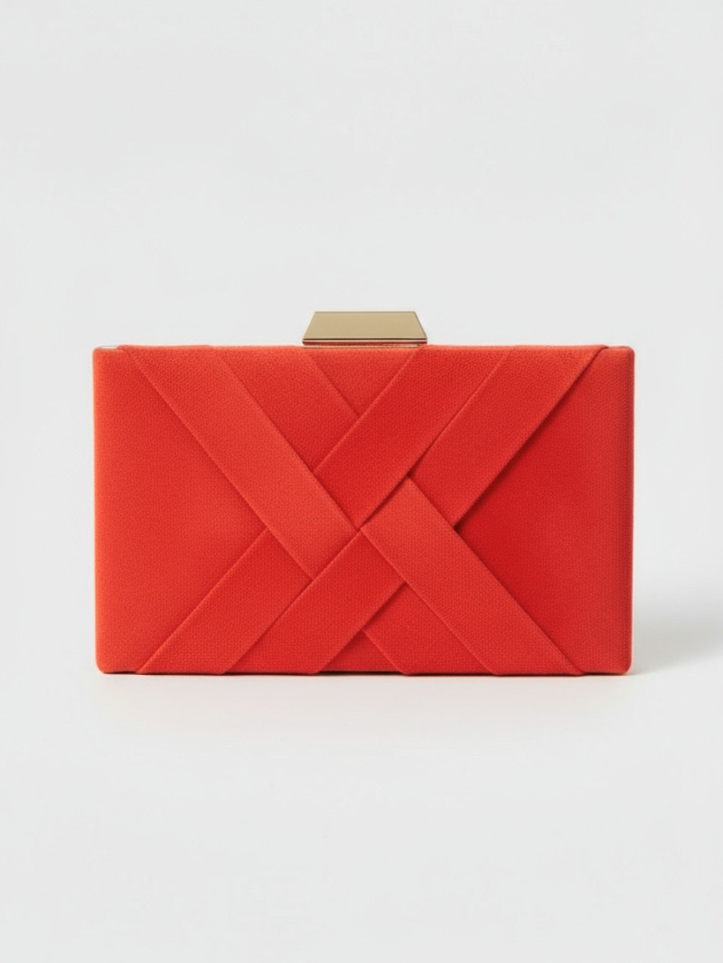 bolso de invitada coral con cierre dorado
