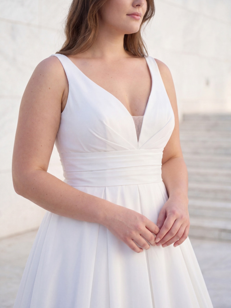 Vestido de novia premium fluido con cola larga y escote en V | Vestidos Araya